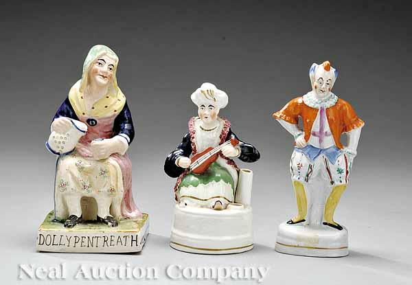 Appraisal: Three Staffordshire Figures th c comprising Dolly Pentreath a clown