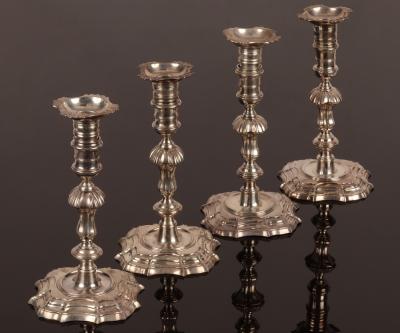 Appraisal: A matched set of four George II cast silver candlesticks