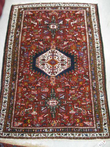 Appraisal: Heriz Persian Handmade Rug outstanding geometrics on deep rich red