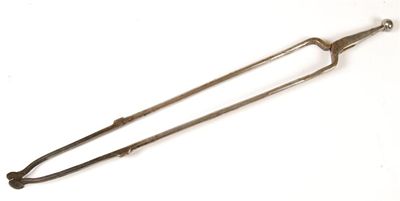 Appraisal: A pair of steel fire tongs with a ball finial