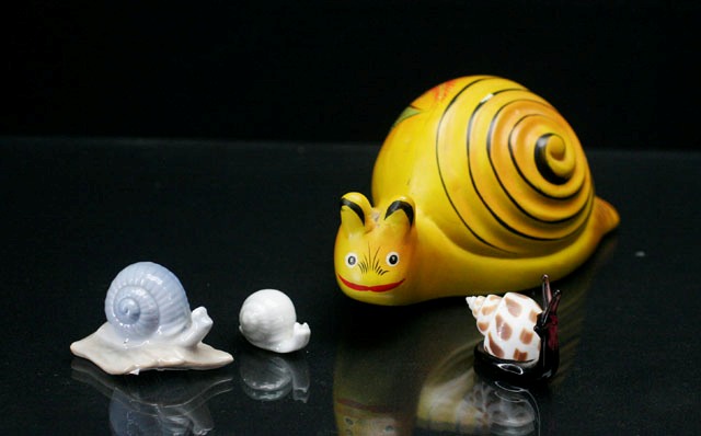 Appraisal: A Wedgwood glass snail together with a collection of smails