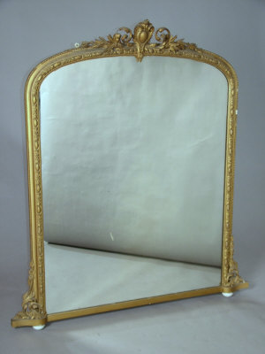 Appraisal: A Victorian gilt framed overmantel mirror the carved and pierced