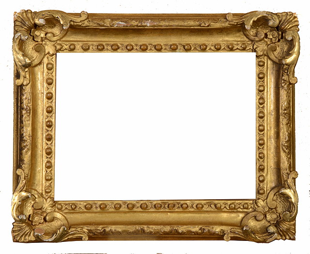 Appraisal: A LATE TH CENTURY GILTWOOD FRAME with shell and 'C'