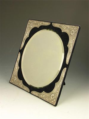 Appraisal: An Edwardian silver mounted easel back mirror having a circular