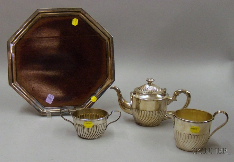 Appraisal: Three-piece Silver Plated Tete-a-Tete Tea Set with Octagonal Wood-inset Salver