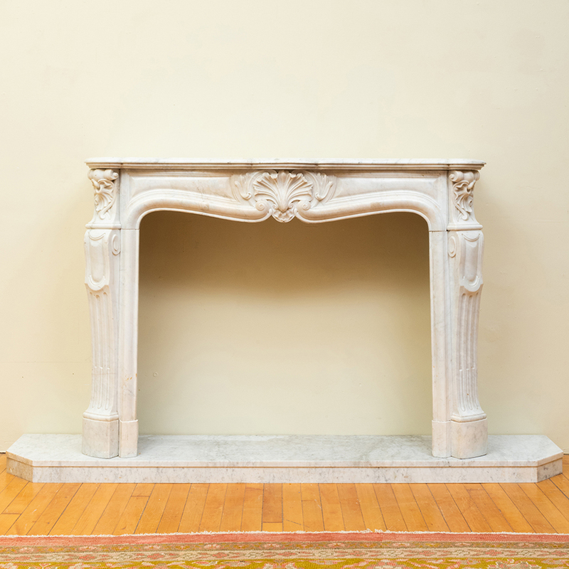 Appraisal: LOUIS XV STYLE WHITE MARBLE MANTEL With a later plinth