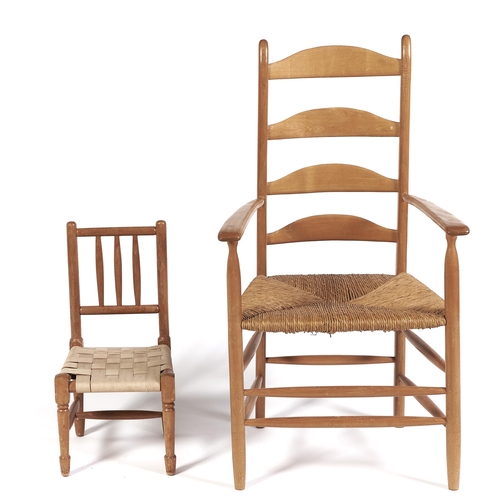 Appraisal: An Arts and Crafts ash ladder back elbow chair rush