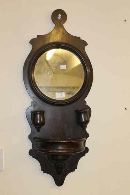 Appraisal: A TH CENTURY STAINED MAHOGANY WALL SCONCE with inset mirror