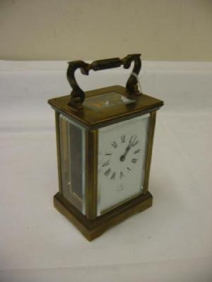 Appraisal: A CARRIAGE CLOCK the single barrel movement with lever platform