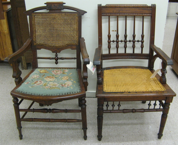 Appraisal: TWO VICTORIAN WALNUT ARMCHAIRS Eastlake design American last quarter of