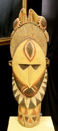 Appraisal: A Papua New Guinea carved ancestral head painted in ochre