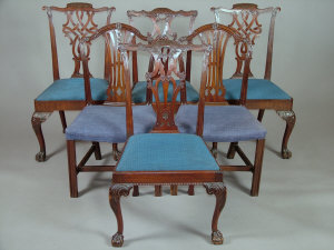 Appraisal: A pair of George III mahogany dining chairs in the