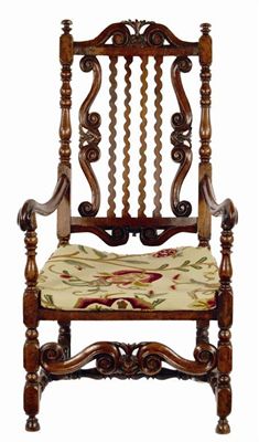 Appraisal: A late th century carved walnut open armchair the back