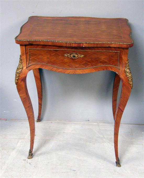 Appraisal: th century French kingwood and parquetry inlaid serpentine dressing table