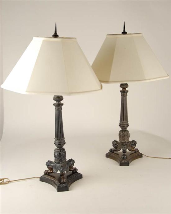 Appraisal: A Pair of Classical Cast Metal Lamps having acanthus gadrooned