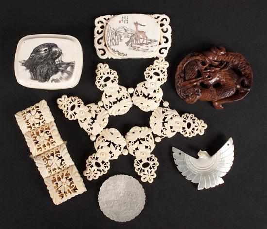 Appraisal: Assortment of bone mother-of-pearl and carved wood objects including belt