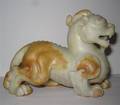 Appraisal: Chinese gray jade qilin carvingModeled as a standing leonine beast