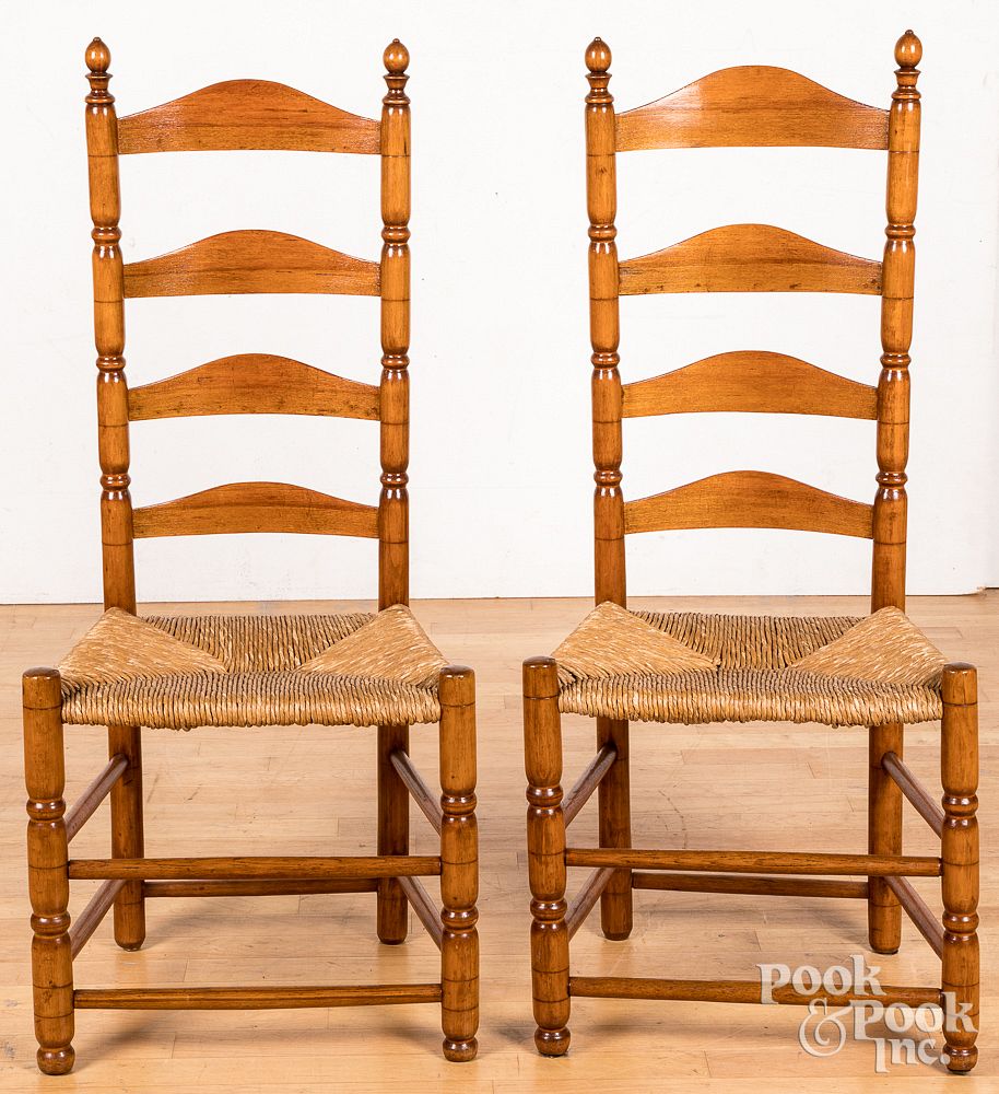 Appraisal: Pair of ladderback side chairs th c Pair of ladderback