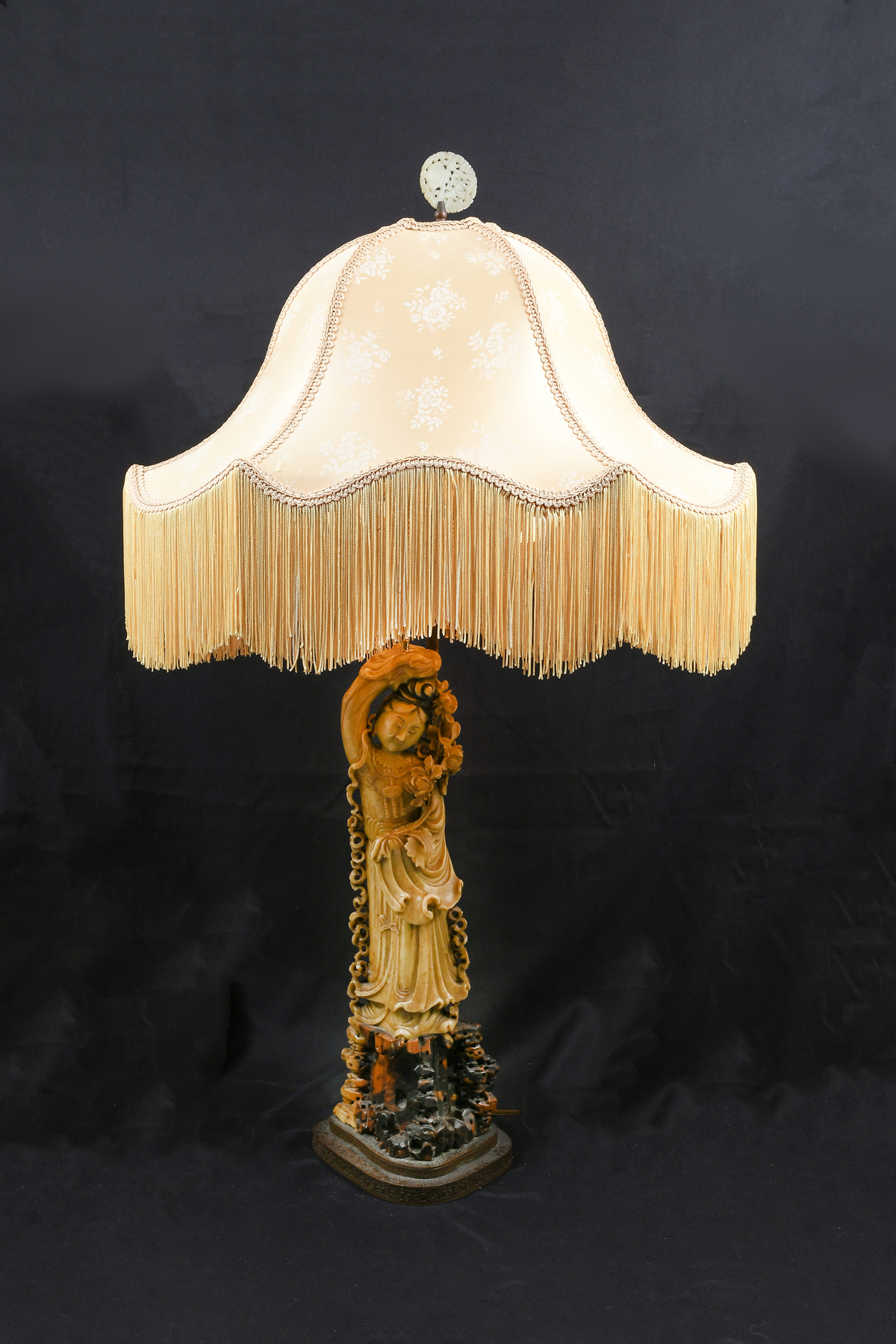 Appraisal: CARVED SOAPSTONE QUAN-YIN LAMP W FRINGED SHADE A two light