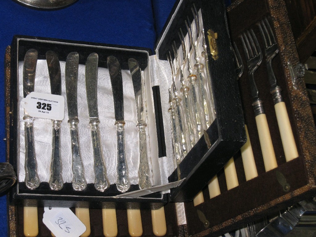 Appraisal: Lot comprising fish cutlery set and a silver handled dessert