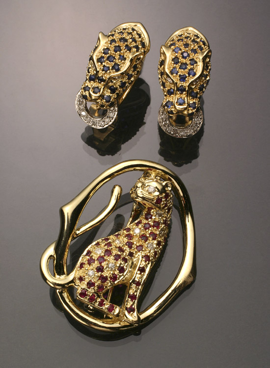 Appraisal: -Karat Yellow-Gold Diamond Ruby and Blue Sapphire Three-Piece Panther Ensemble