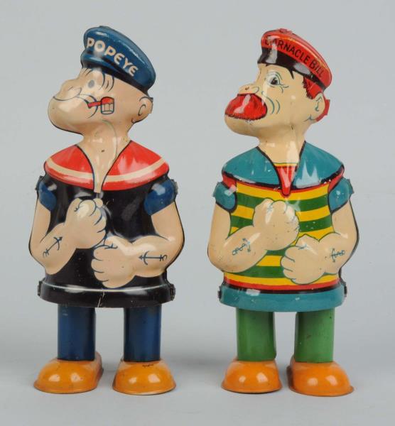 Appraisal: Lot Of Chein Tin Litho Walking Toys One is Popeye