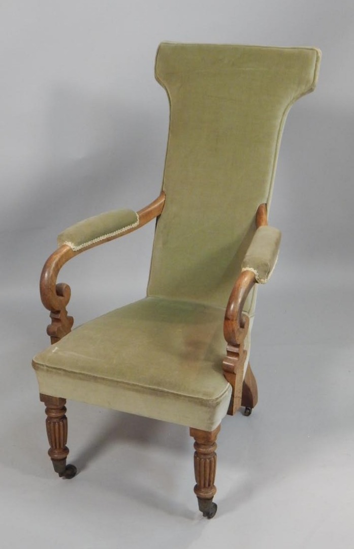 Appraisal: An early Victorian mahogany armchair with a shaped back scroll