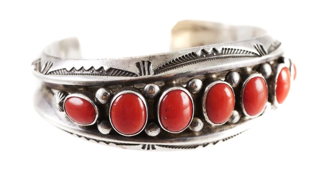 Appraisal: Signed Navajo sterling silver cuff bracelet with coral cabochons Very