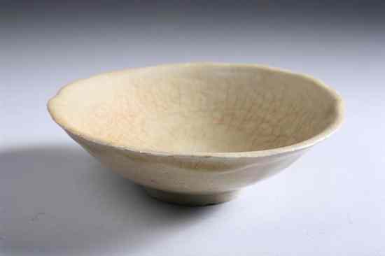 Appraisal: CHINESE CELADON STONEWARE BOWL Southern Song Dynasty th century Mallow-form