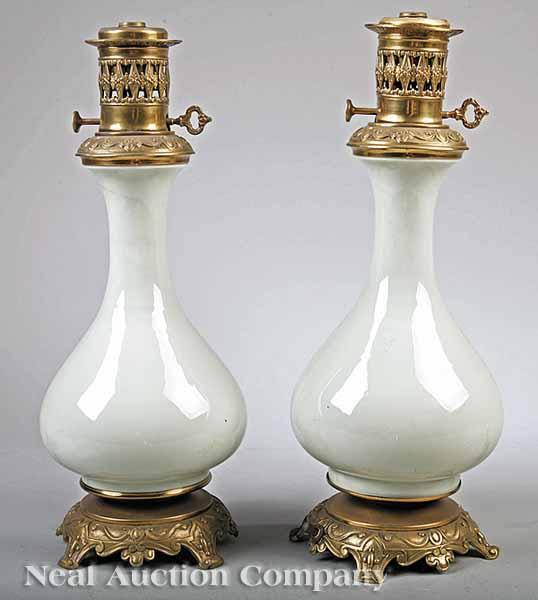 Appraisal: A Pair of Victorian Gilt Brass and Celadon Porcelain Carcel