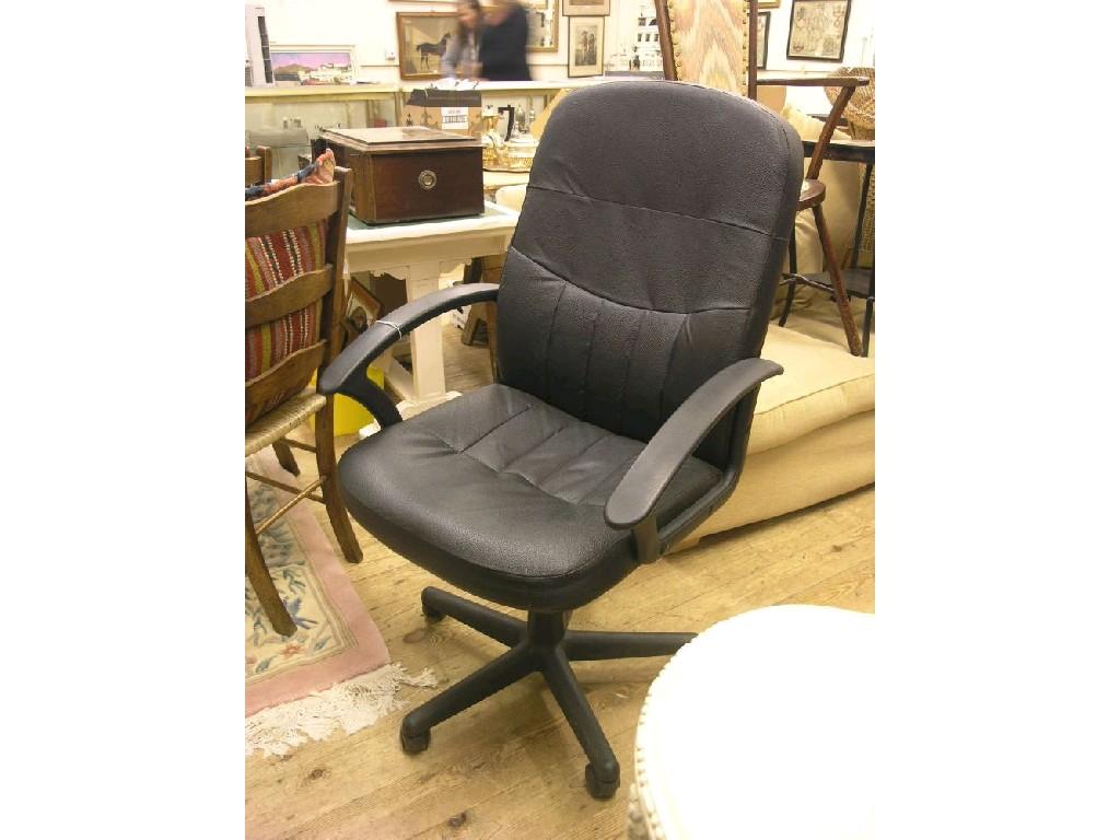 Appraisal: A black leatherette desk chair swivel-action on five casters