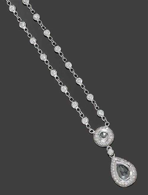 Appraisal: DIAMOND NECKLACE White gold Charming necklace the drop-shaped pendant set