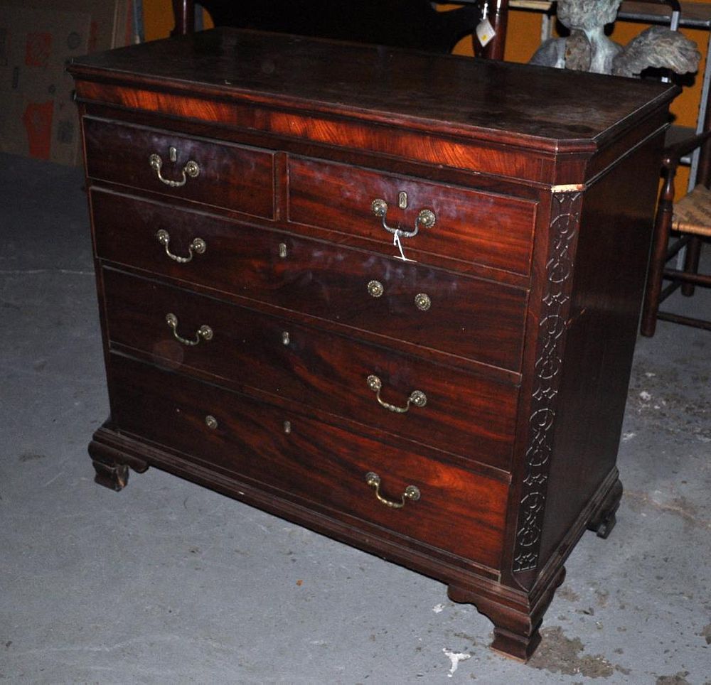 Appraisal: George III Carved Mahogany Chest with blind fret carved canted