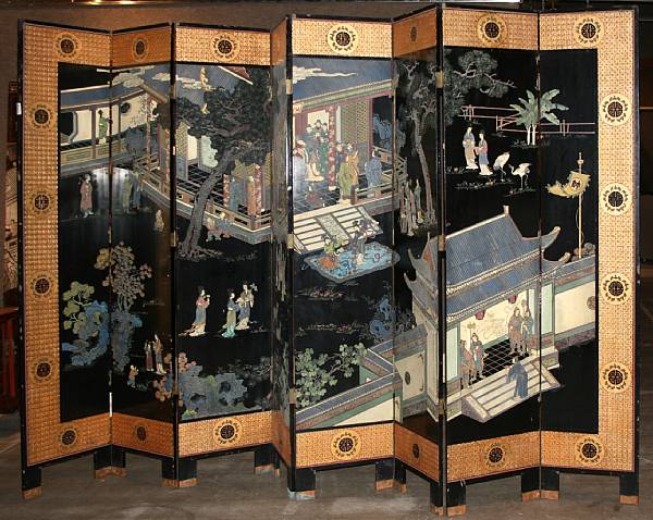 Appraisal: An eight-panel black-lacquered wood coromandel floor screen Carved and painted