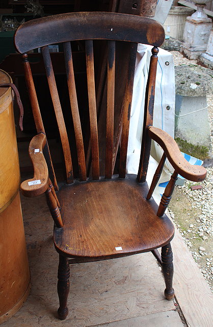 Appraisal: A VICTORIAN LATHE BACK ELBOW CHAIR cm wide and a