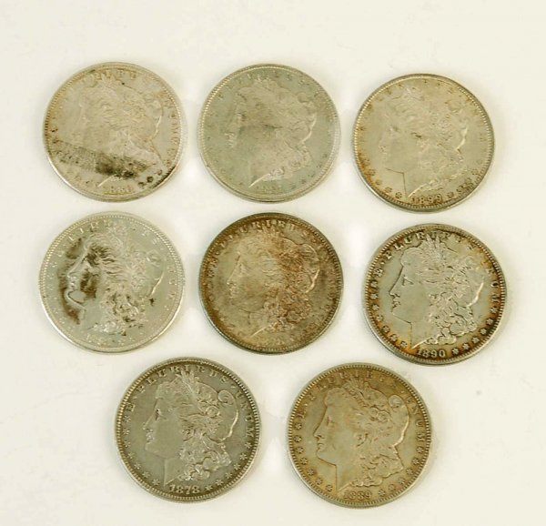 Appraisal: Eight Morgan silver dollars -S -S two -S -S -S