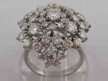 Appraisal: A white metal tests platinum diamond cluster ring set with