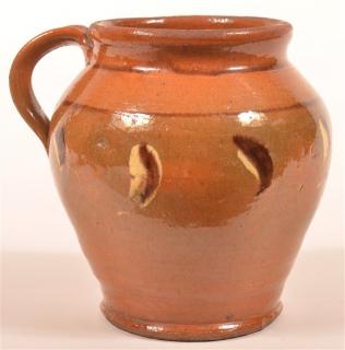 Appraisal: Shenandoah Valley Handled Storage Crock Yellow and brown slip decoration