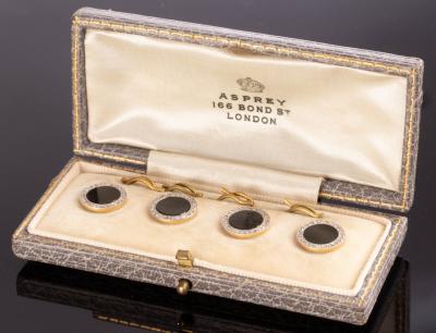 Appraisal: A set of four onyx and diamond dress buttons set