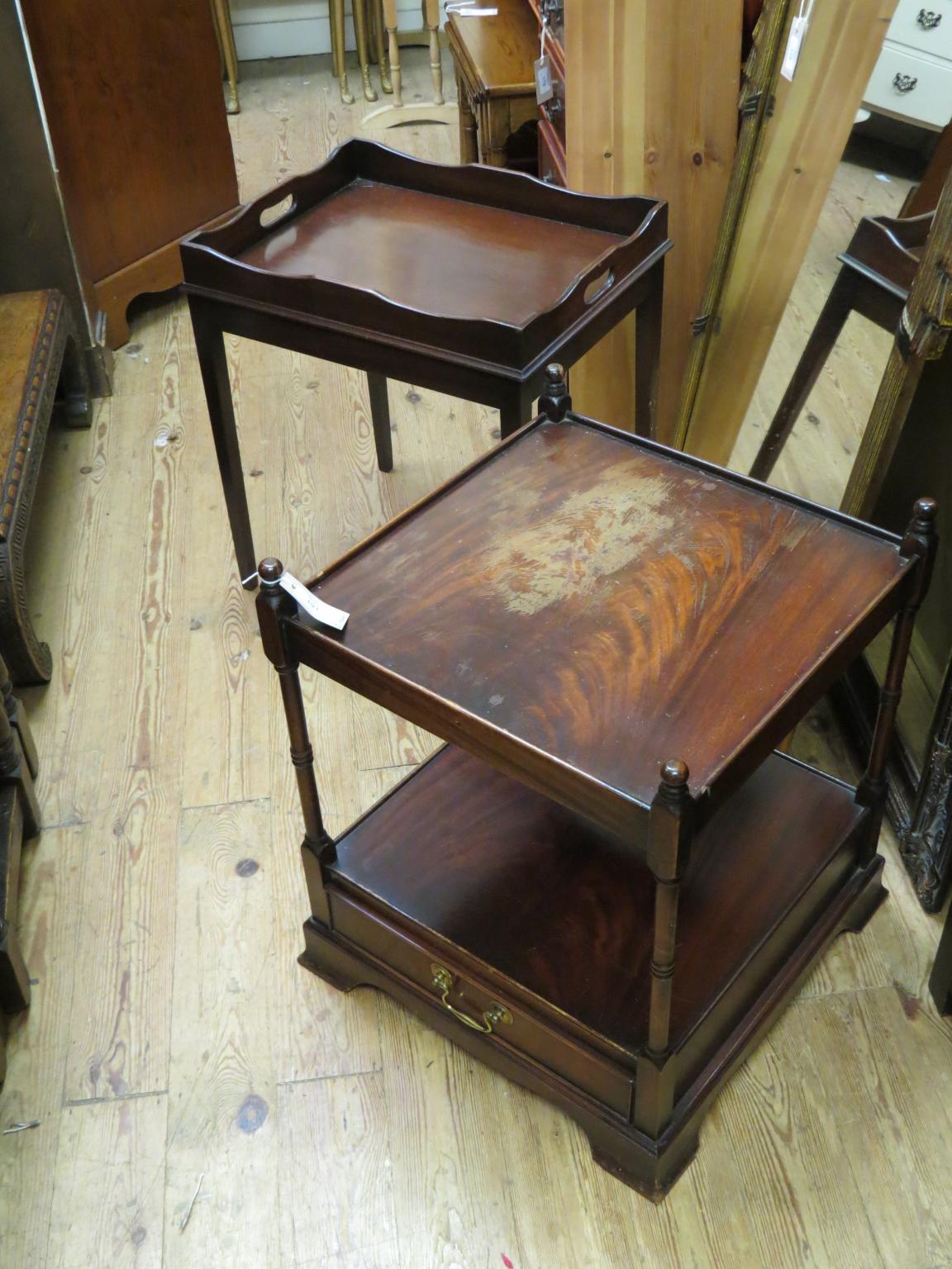 Appraisal: A mahogany two-tiered occasional table with drawer ft in -