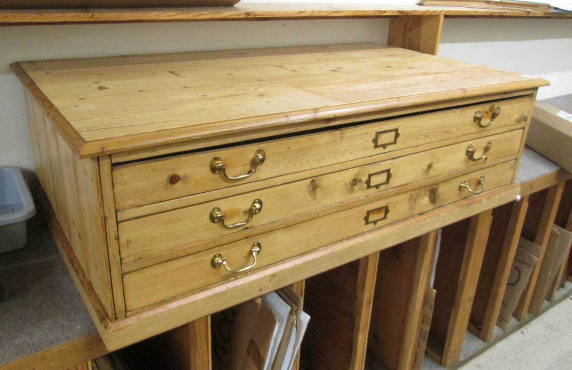 Appraisal: THREE-DRAWER PINE MAP CHEST a rectangular chest of coffee table