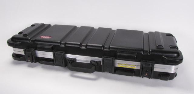 Appraisal: SKB Hardshell Gun Case wheeled with spring-loaded handle for pulling