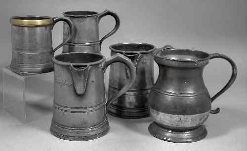 Appraisal: Two Victorian pewter lipped quart tankards one for W Usher