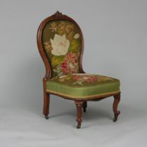 Appraisal: Victorian Boudoir Chair Slipper chair features a walnut wood frame