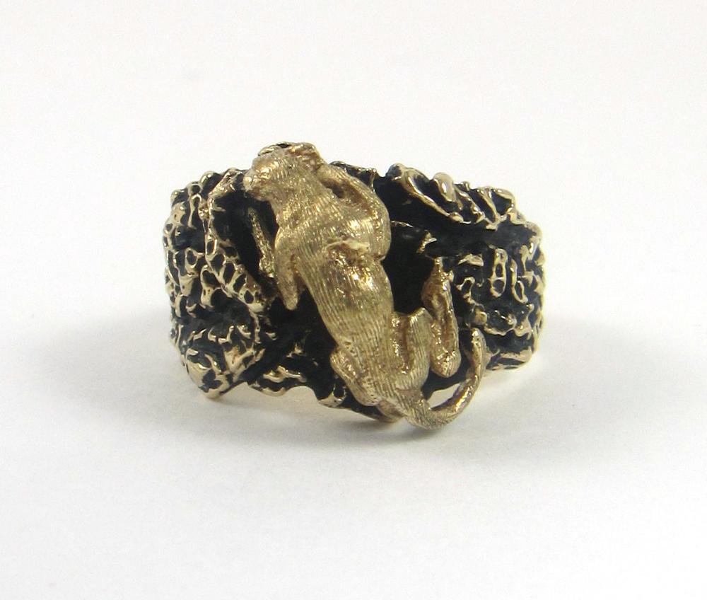 Appraisal: MEN'S TEN KARAT YELLOW GOLD LION RING weighing grams and