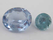 Appraisal: Two loose polished blue stones approx carats