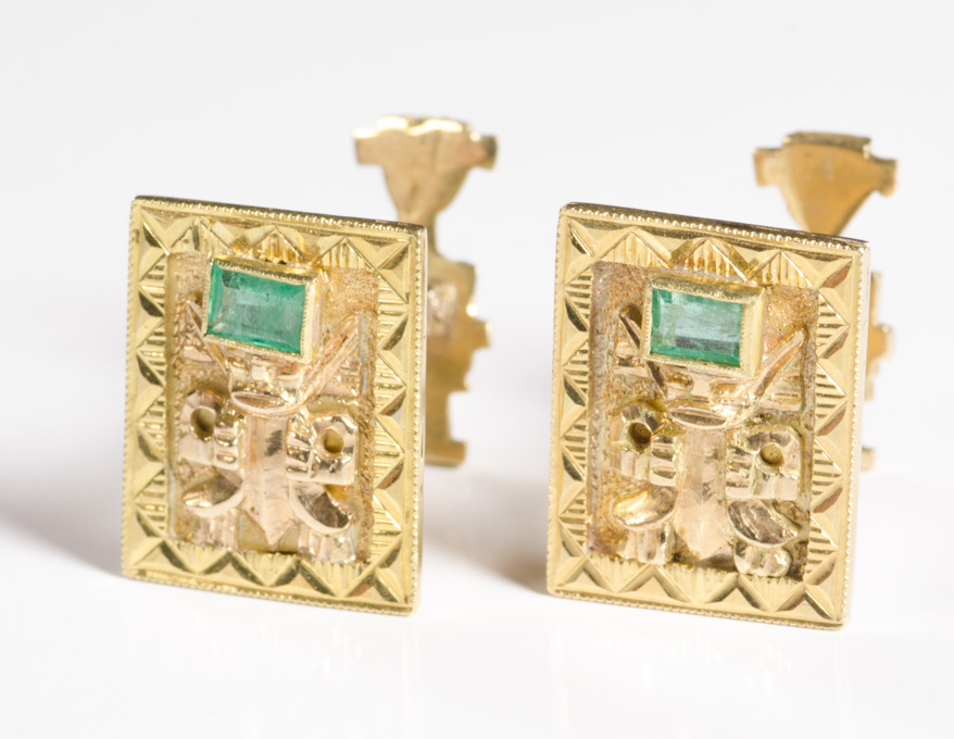 Appraisal: A PAIR OF EIGHTEEN KARAT GOLD AND EMERALD CUFFLINKS Mahan