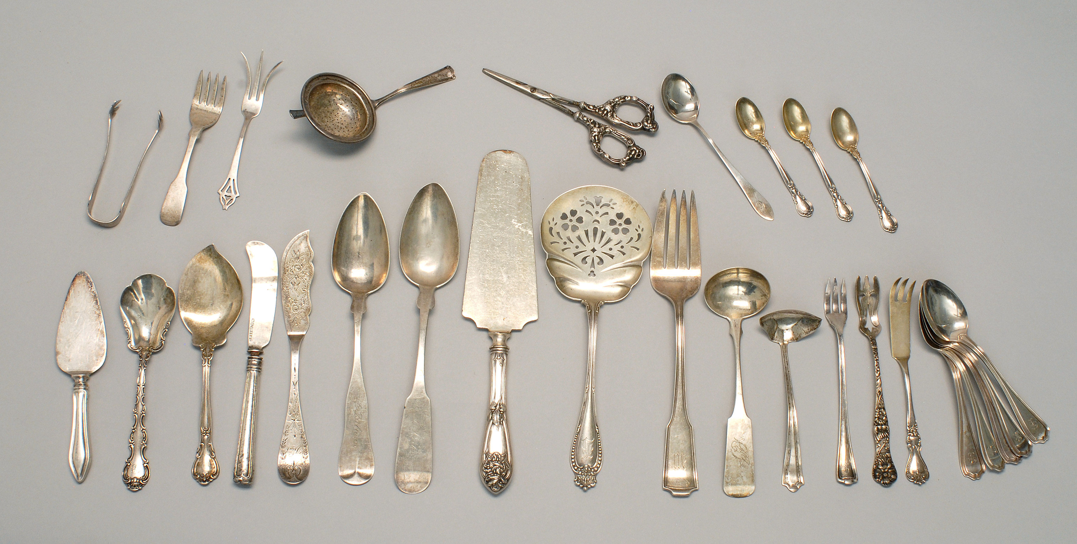 Appraisal: TWENTY-NINE PIECES OF STERLING SILVER FLATWARE by various makers Includes