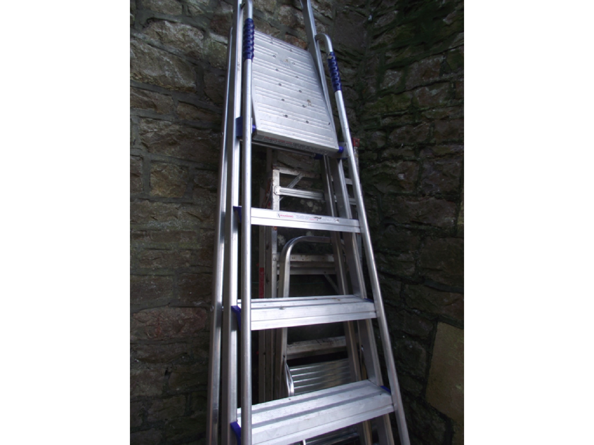 Appraisal: A Clima extending aluminium ladder together with an Abru seven