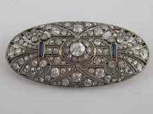 Appraisal: A fine Art Deco sapphire and diamond brooch the central